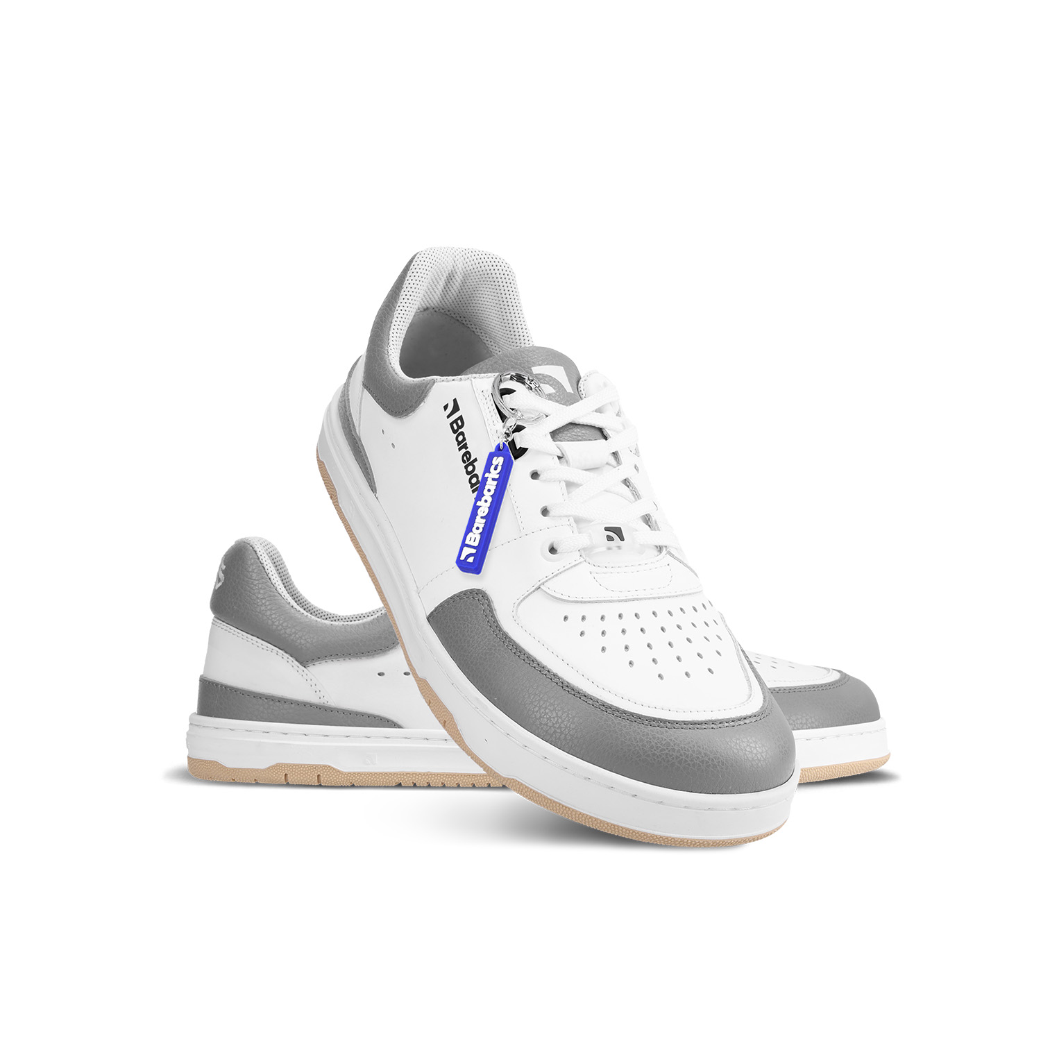 Barefoot Sneakers Barebarics Wave - White & Grey.
La parte superior está hecha de poliamida, elastano y cuero nobuk con tratamiento hidrofóbico que repele muy bien el agua.
Atributos del calzado barefoot
Forma anatómica - La zapatilla respeta la forma del pie.
Más información
calzado de callediseño urbano modernodiseñado y hecho a mano en la Unión Europea con el uso de materiales sostenibles localesexcelente durabilidad y solidez del color de los materialesdisponibles en tallas: 36 - 47 (según medida europea)EAN/SKU: %eanorsku%