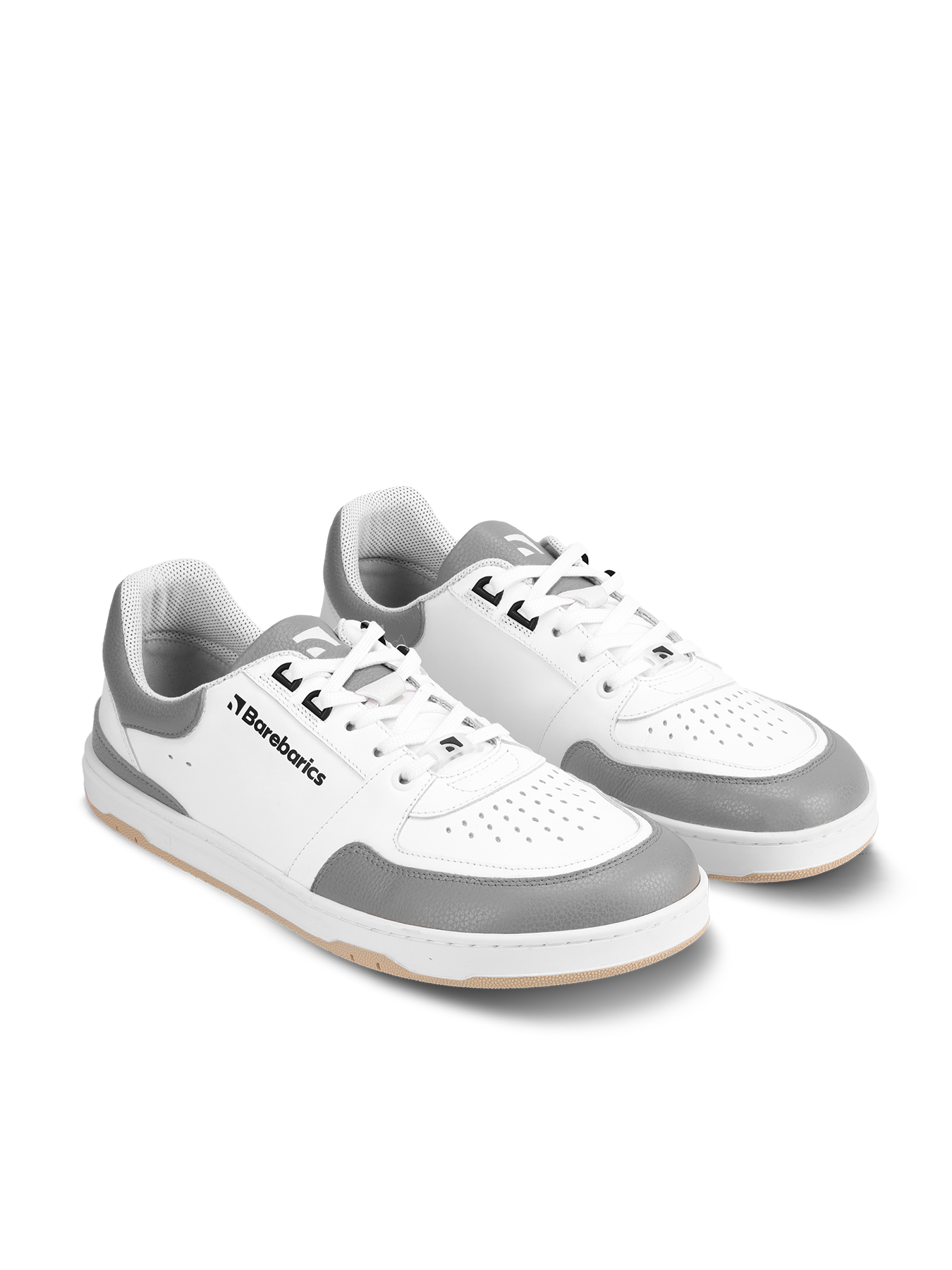 Barefoot Sneakers Barebarics Wave - White & Grey.
La parte superior está hecha de poliamida, elastano y cuero nobuk con tratamiento hidrofóbico que repele muy bien el agua.
Atributos del calzado barefoot
Forma anatómica - La zapatilla respeta la forma del pie.
Más información
calzado de callediseño urbano modernodiseñado y hecho a mano en la Unión Europea con el uso de materiales sostenibles localesexcelente durabilidad y solidez del color de los materialesdisponibles en tallas: 36 - 47 (según medida europea)EAN/SKU: %eanorsku%