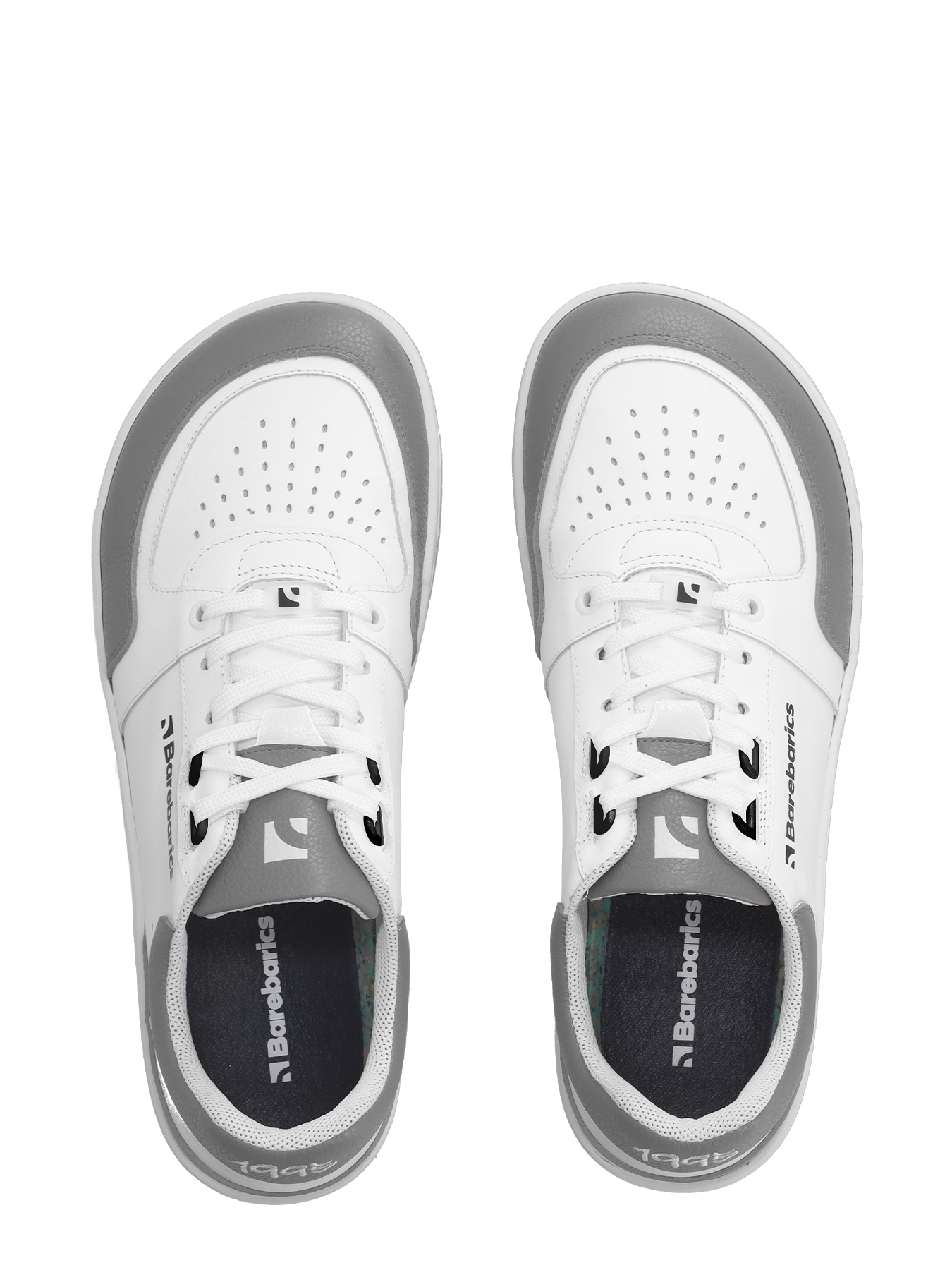 Barefoot Sneakers Barebarics Wave - White & Grey.
La parte superior está hecha de poliamida, elastano y cuero nobuk con tratamiento hidrofóbico que repele muy bien el agua.
Atributos del calzado barefoot
Forma anatómica - La zapatilla respeta la forma del pie.
Más información
calzado de callediseño urbano modernodiseñado y hecho a mano en la Unión Europea con el uso de materiales sostenibles localesexcelente durabilidad y solidez del color de los materialesdisponibles en tallas: 36 - 47 (según medida europea)EAN/SKU: %eanorsku%